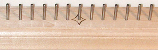 Detail on Center Diamond on Treeditions' Maple Raddle
